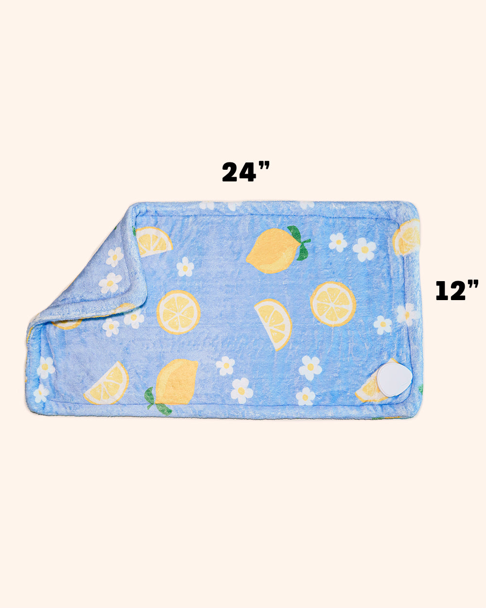 Blue heating pad with lemon pattern and measurements on a white background