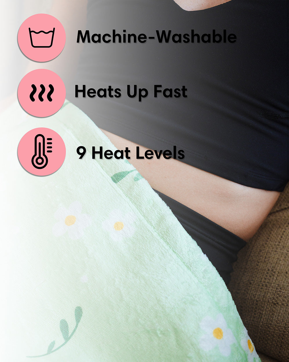 Cute green heating pad with text indicating machine-washable, quick heating, and multiple heat level features.